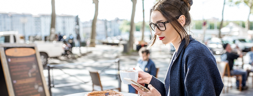 Woman searching on her smartphone